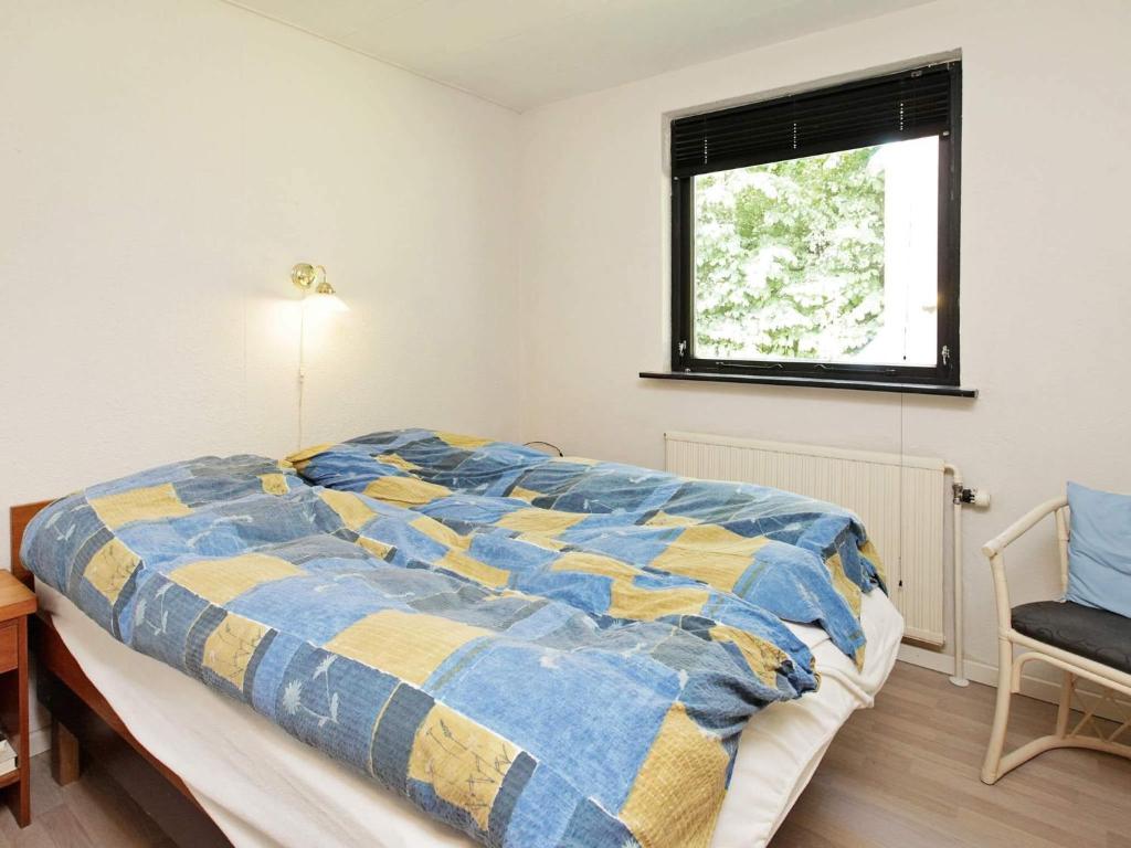 Postel nebo postele na pokoji v ubytování 8 person holiday home in Struer-By Traum