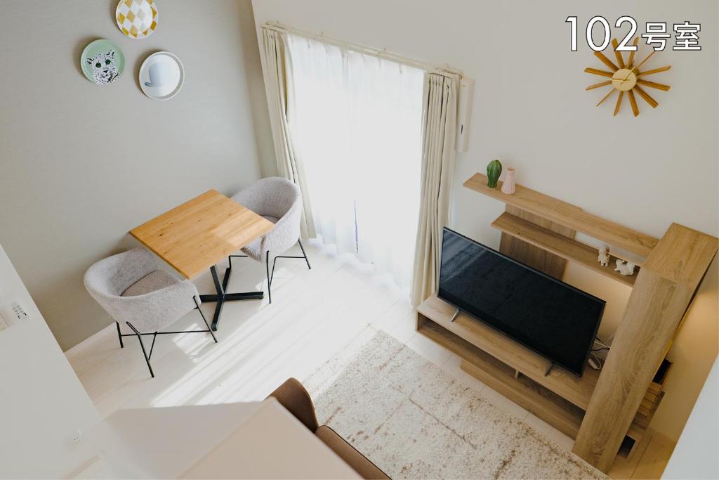 Posezení v ubytování YOUR ROOM 熊本駅 little