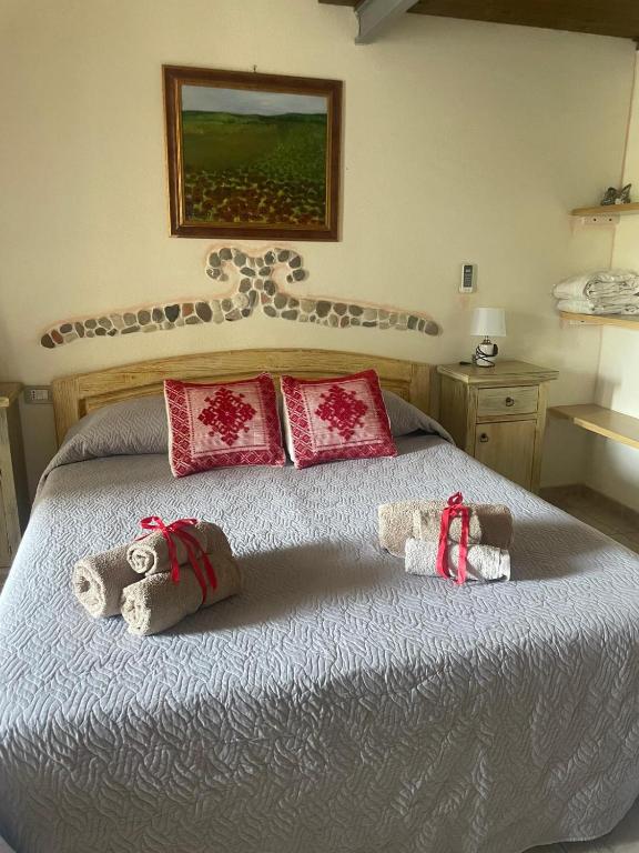Postel nebo postele na pokoji v ubytování Hotel Valle del Cedrino