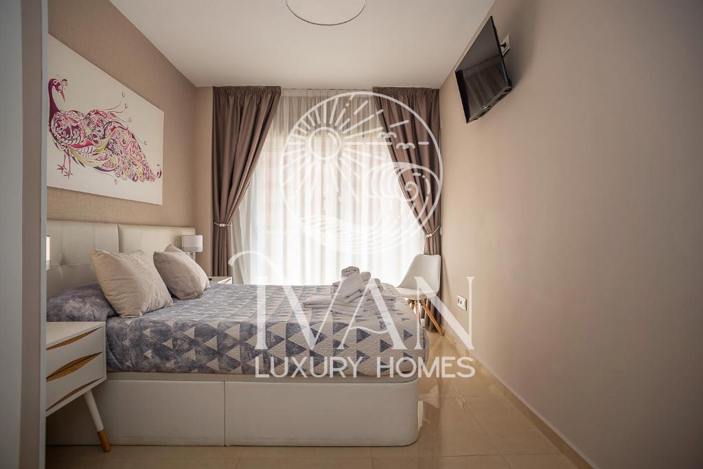 Posteľ alebo postele v izbe v ubytovaní Casa Miriam Ivan Luxury Homes 2ªPlta Sur 1ªLinea