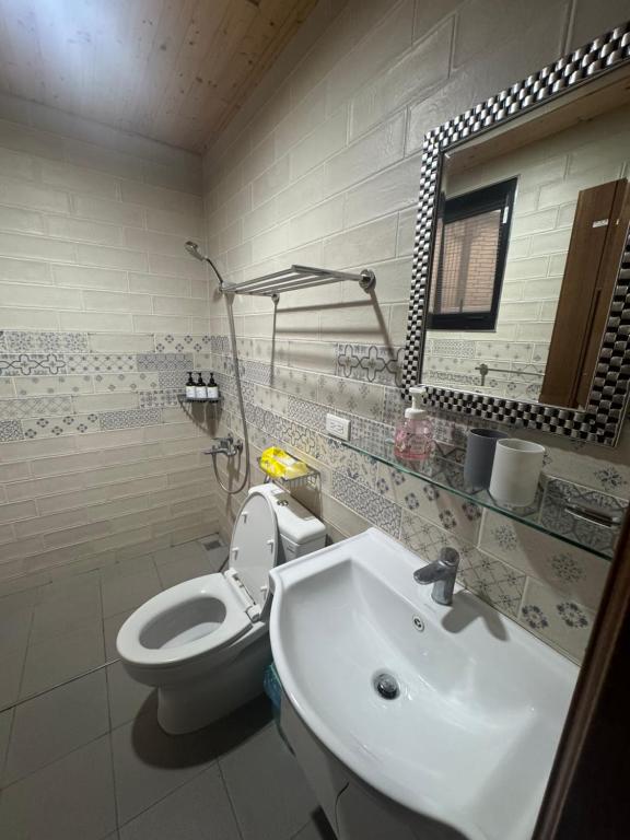 Vannituba majutusasutuses Apple Homestay