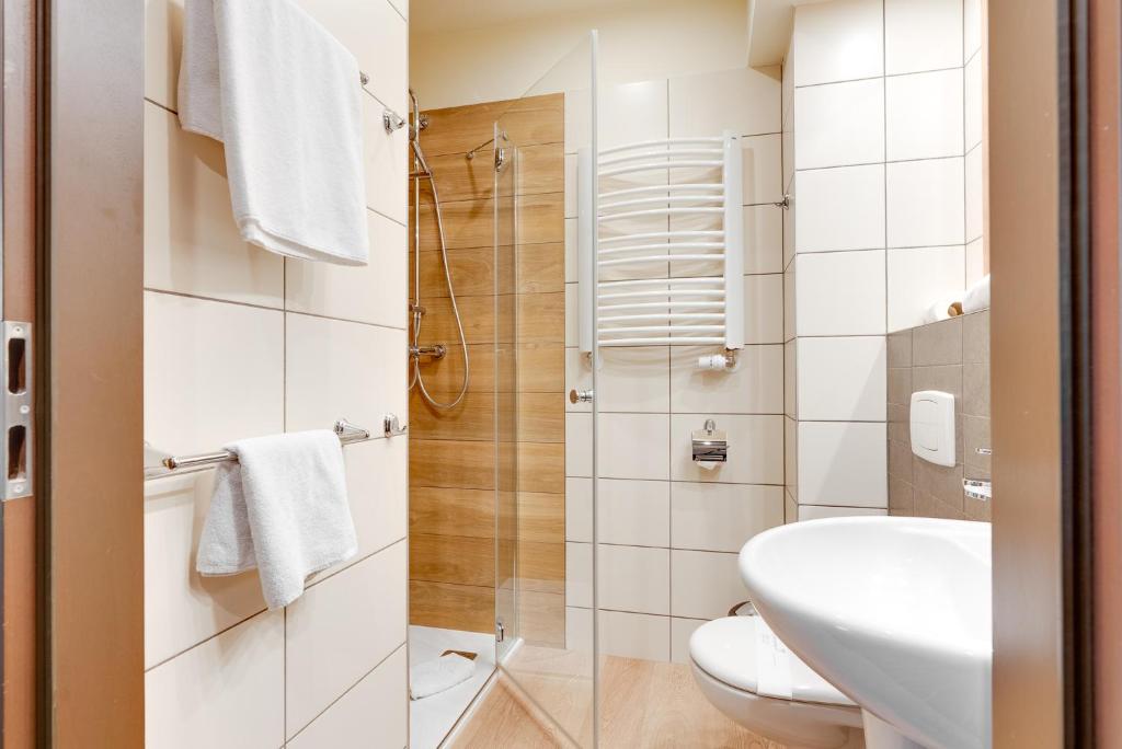 Ein Badezimmer in der Unterkunft Park Hotel Diament Katowice