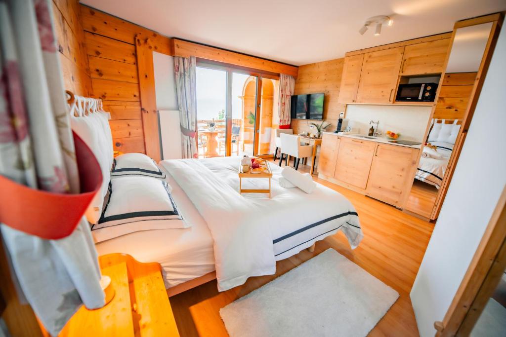 Kuchyň nebo kuchyňský kout v ubytování Clouds Studio Alpin Luxury View and Pool