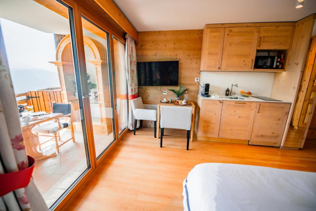 Postel nebo postele na pokoji v ubytování Clouds Studio Alpin Luxury View and Pool