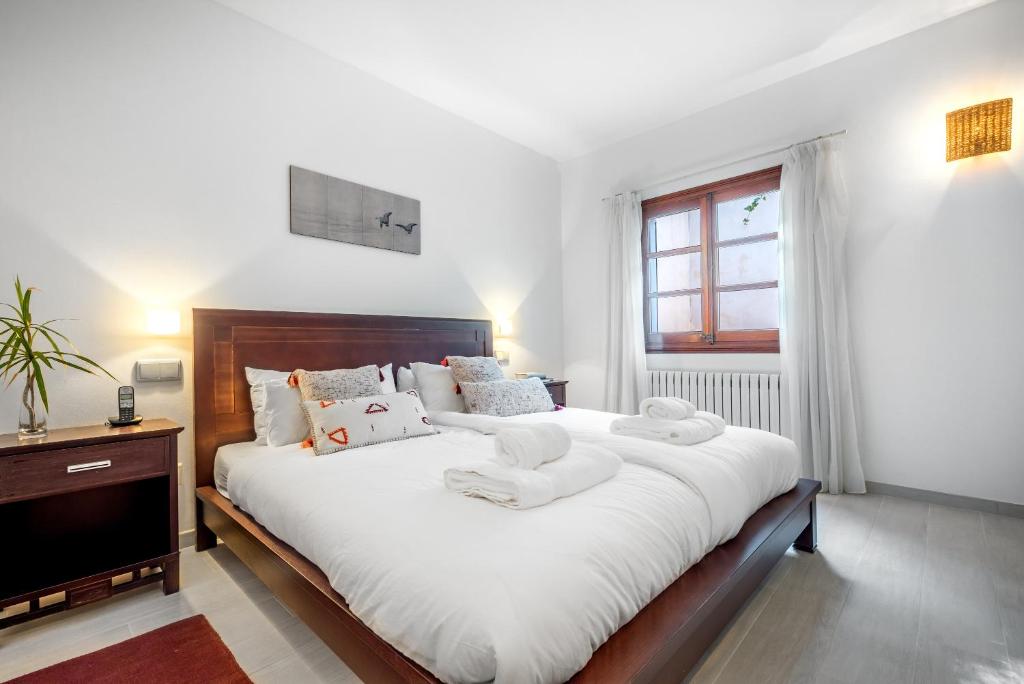 Postel nebo postele na pokoji v ubytování Casa del Puerto