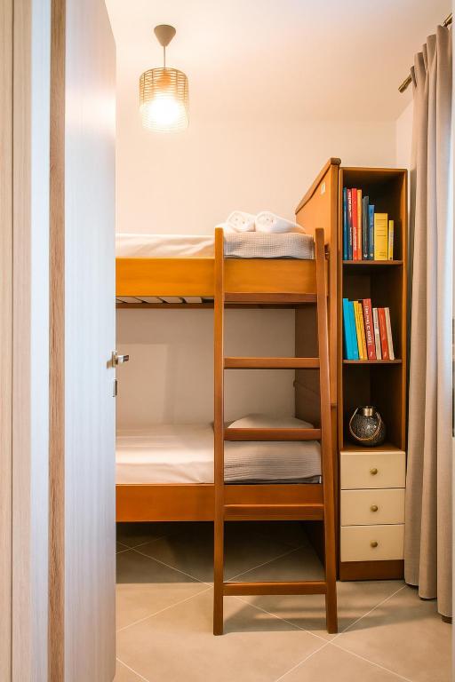 Posteľ alebo postele v izbe v ubytovaní Onar Zin Seabliss - Majestic Getaways