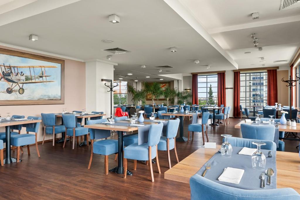 Ein Restaurant oder anderes Speiselokal in der Unterkunft Park Hotel Diament Katowice 