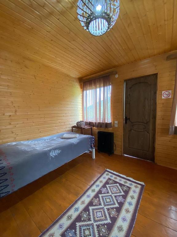 Cama o camas de una habitación en Ushguli Cabins