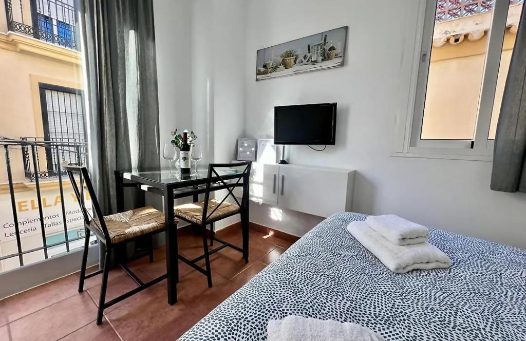 Posteľ alebo postele v izbe v ubytovaní El Rincón de la Carihuela