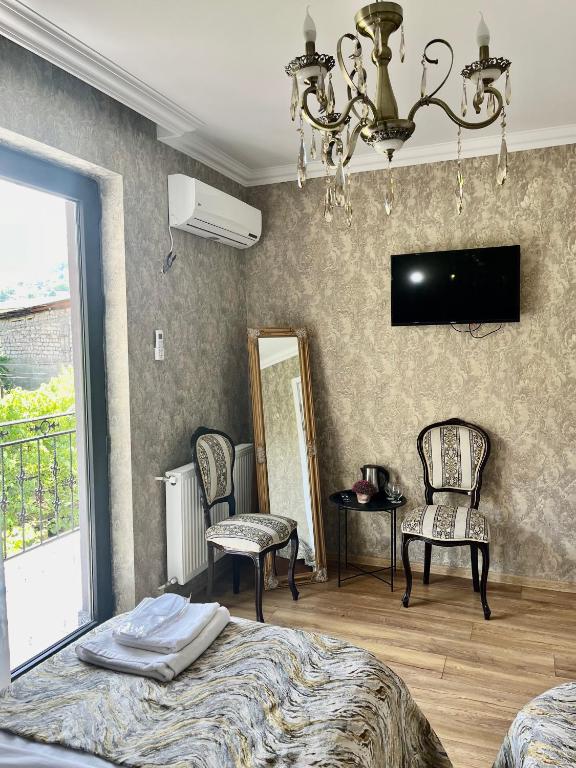 Postel nebo postele na pokoji v ubytování Hotel Sunny Days Borjomi