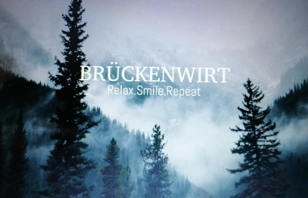a painting of a forest with trees in the foreground at Gasthof Brückenwirt Hotel in Sölden