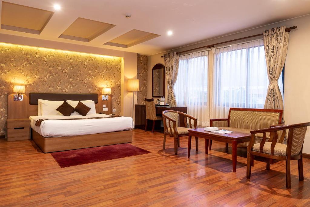 Postel nebo postele na pokoji v ubytování Hotel Mirage Regency