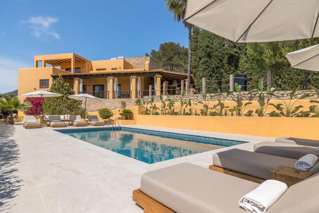 Πισίνα στο ή κοντά στο Casa Four charming Ibiza villa with sea view!