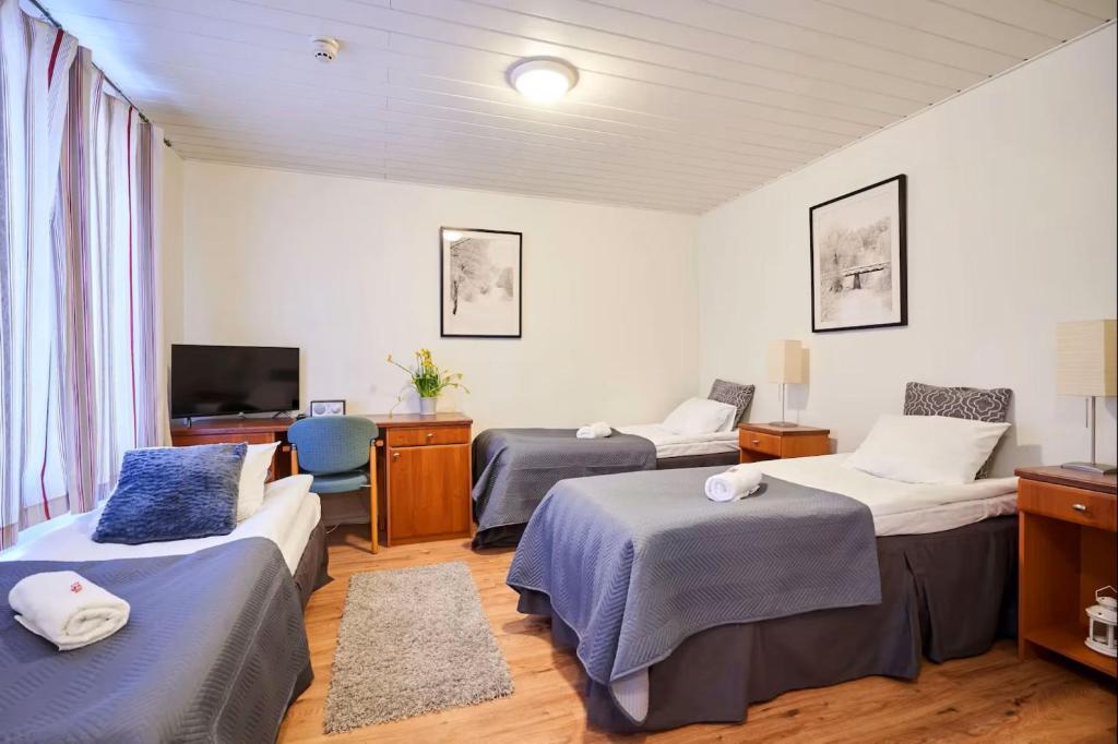 Postel nebo postele na pokoji v ubytování Hotel Hight le mount