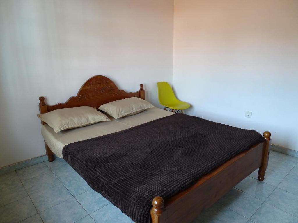 Postel nebo postele na pokoji v ubytování Ceylon Glory Hostel