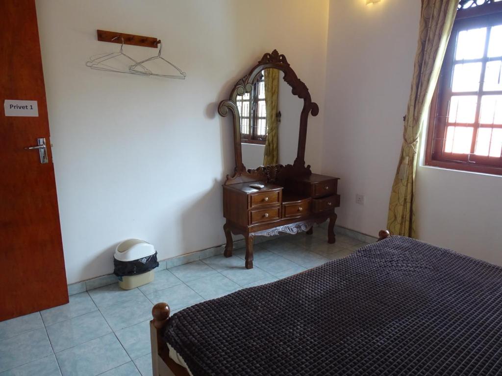Postel nebo postele na pokoji v ubytování Ceylon Glory Hostel