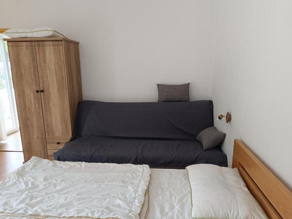 Postel nebo postele na pokoji v ubytování Apartments by the sea Pasman - 8219