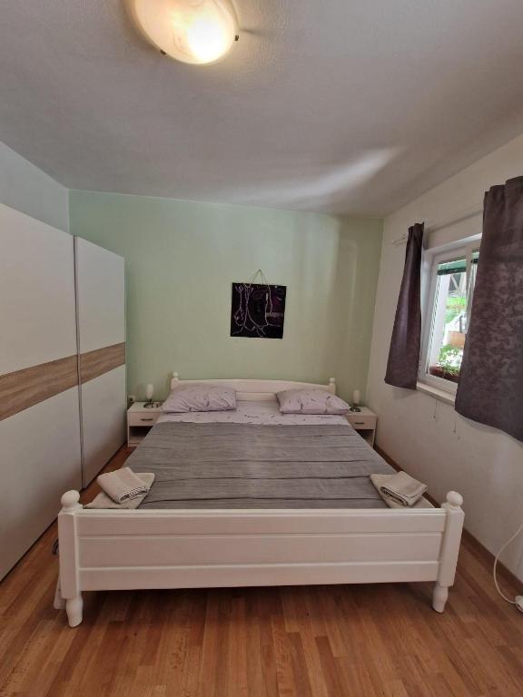 Posteľ alebo postele v izbe v ubytovaní Apartments by the sea Korcula - 4349