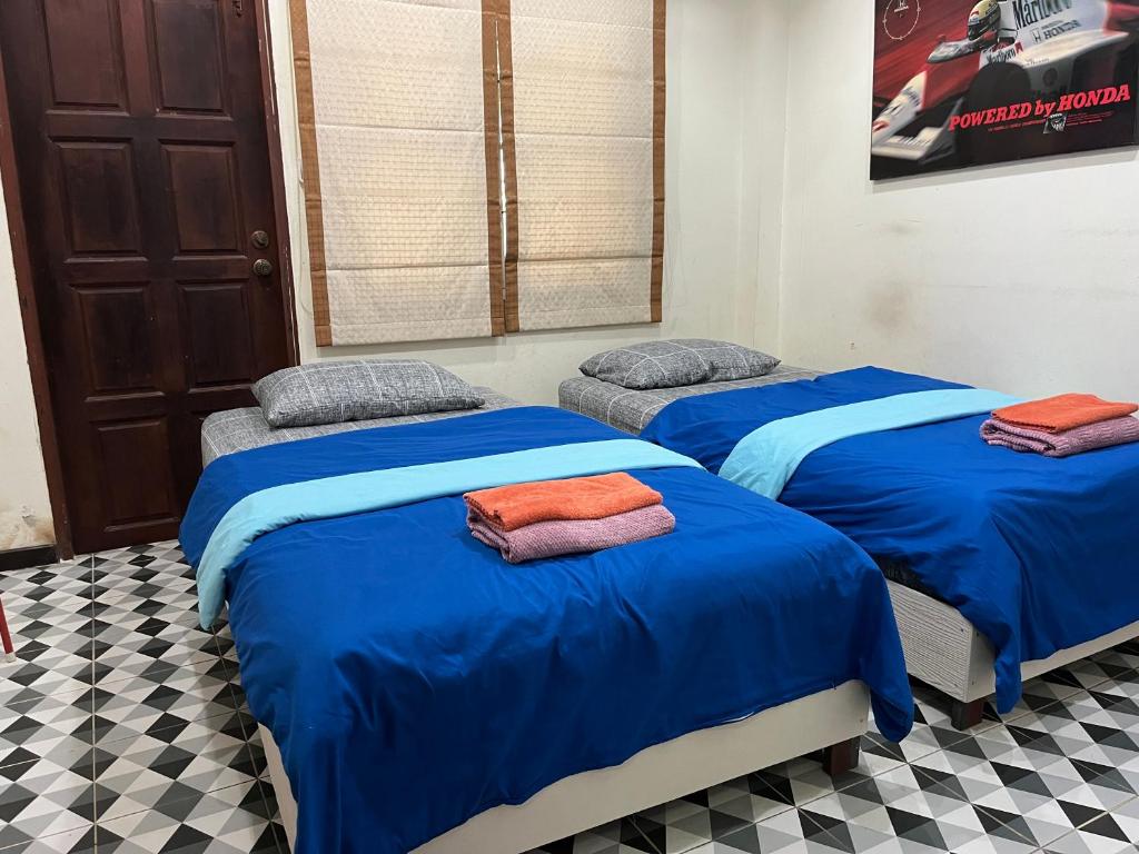 Postel nebo postele na pokoji v ubytování Poolvilla Armthong Home