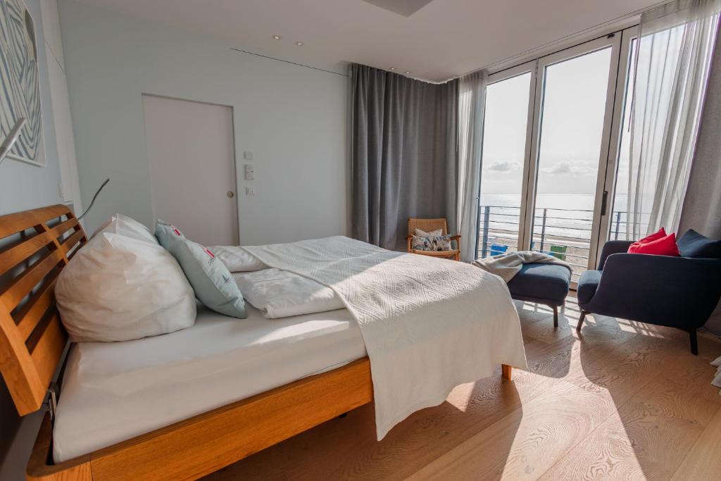 Postel nebo postele na pokoji v ubytování Strandhaus