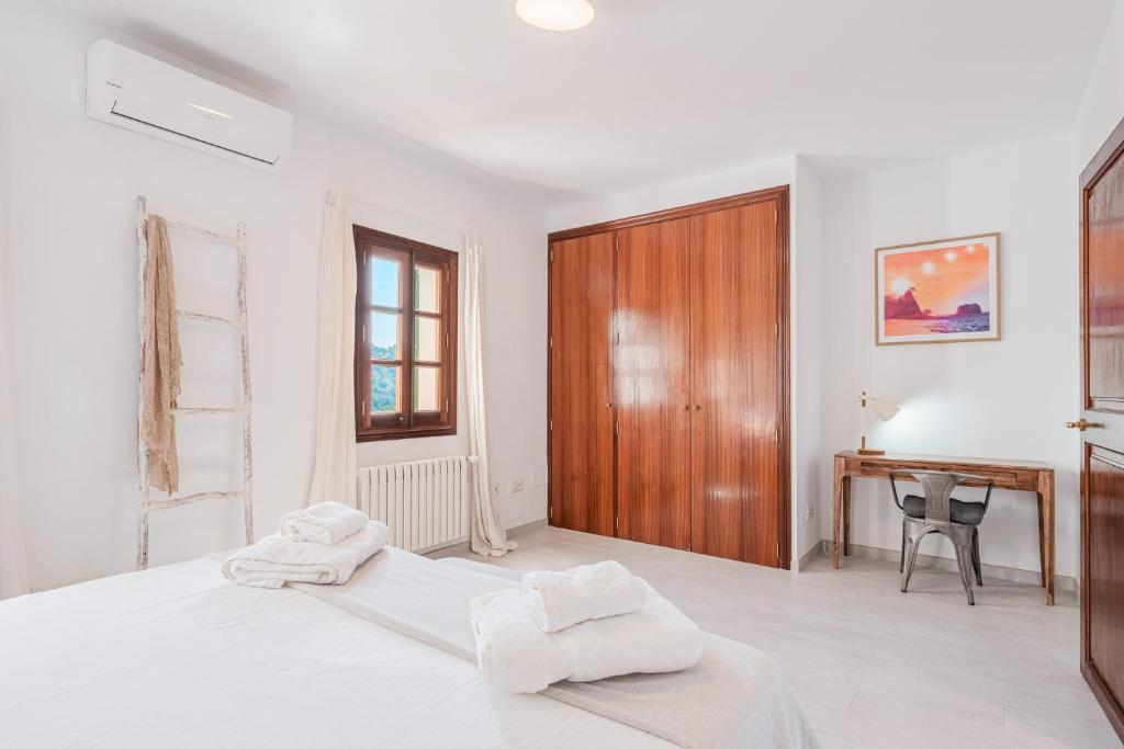 Postel nebo postele na pokoji v ubytování Casa del Puerto