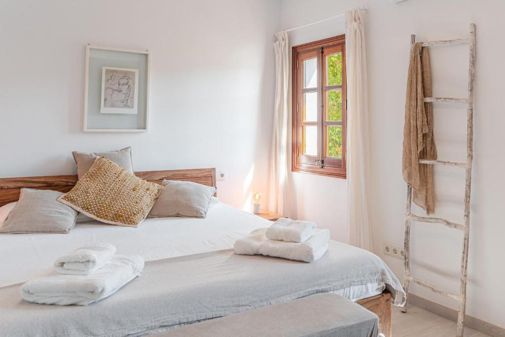 Postel nebo postele na pokoji v ubytování Casa del Puerto