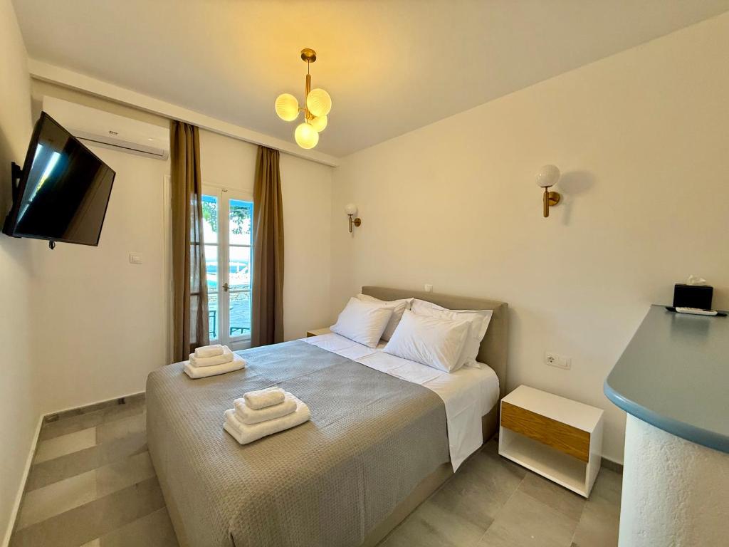 Postel nebo postele na pokoji v ubytování Yaleena Residences