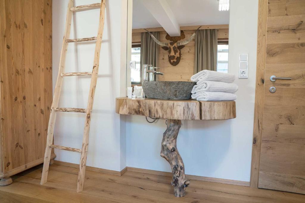 Postel nebo postele na pokoji v ubytování Atelier Garni Astei