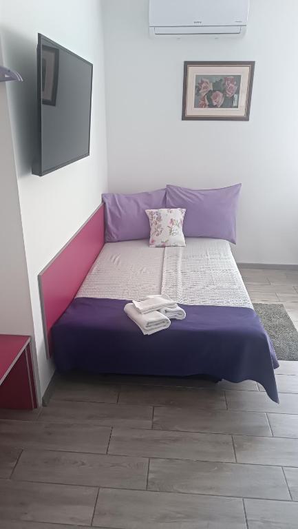 Posteľ alebo postele v izbe v ubytovaní Rooms Jelak
