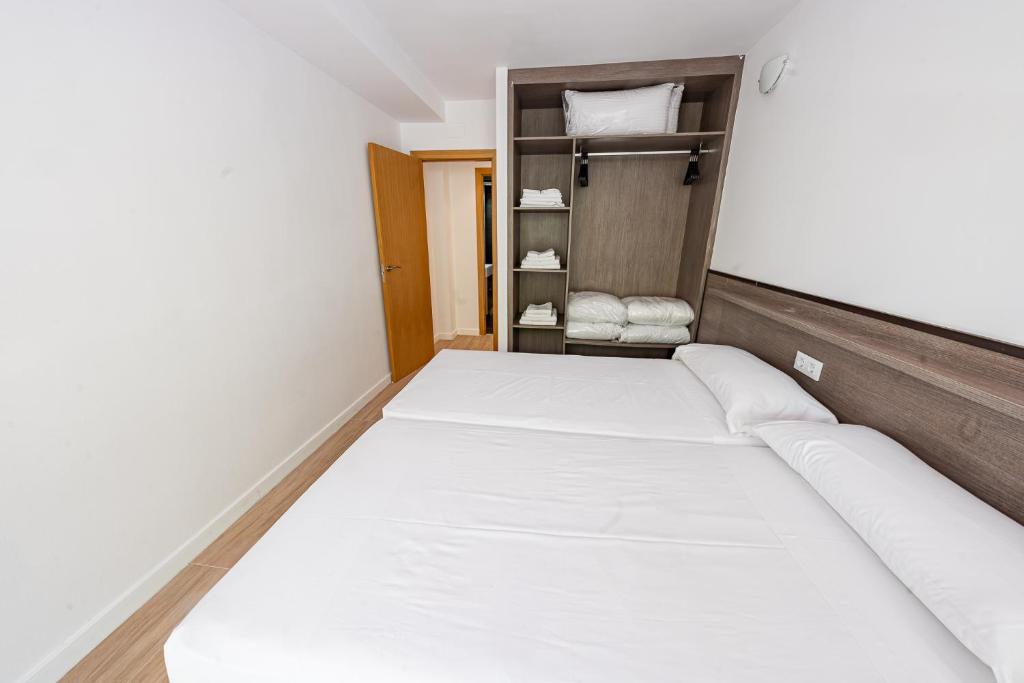 Posteľ alebo postele v izbe v ubytovaní Park Suites Family Rentalmar