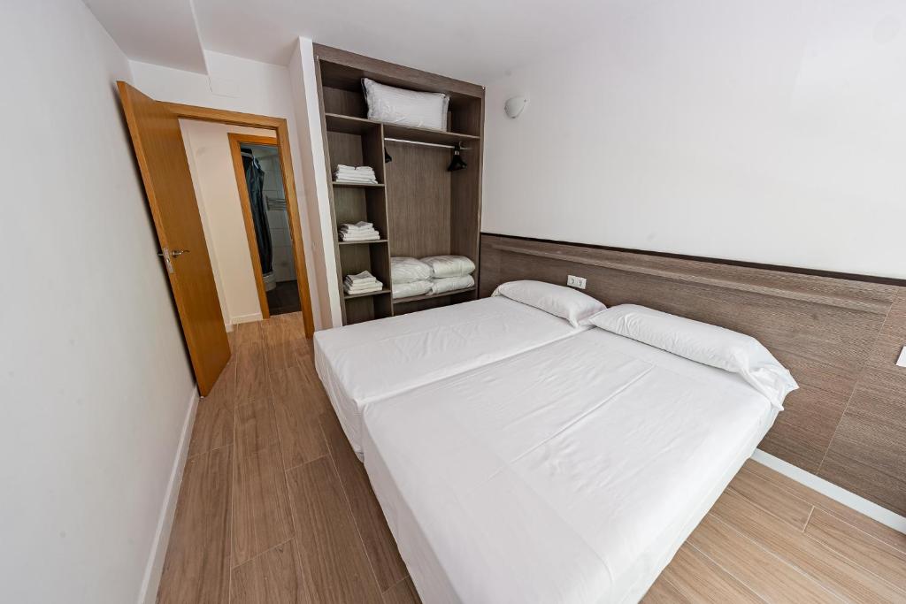 Posteľ alebo postele v izbe v ubytovaní Park Suites Family Rentalmar