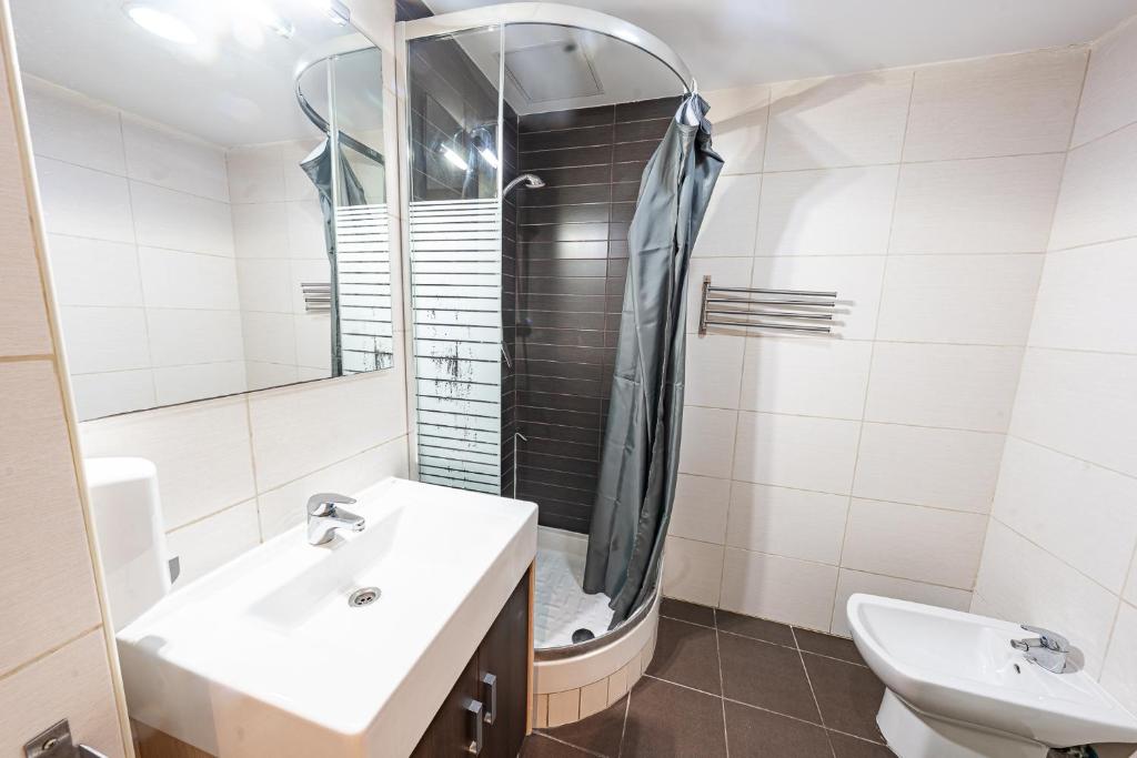 Kúpeľňa v ubytovaní Park Suites Family Rentalmar