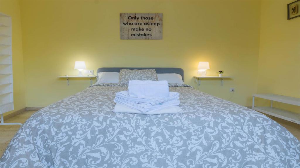Postel nebo postele na pokoji v ubytování Apartamento Pergo Centro Córdoba