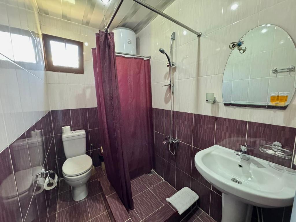 Koupelna v ubytování Hotel Lileo