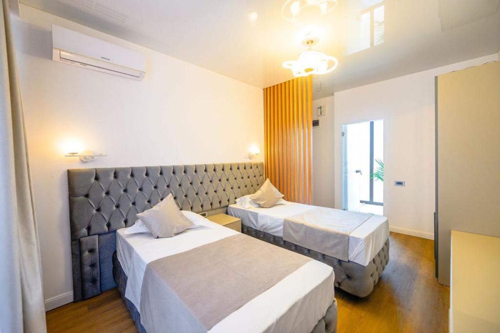 Katil atau katil-katil dalam bilik di Office Villas Costinesti