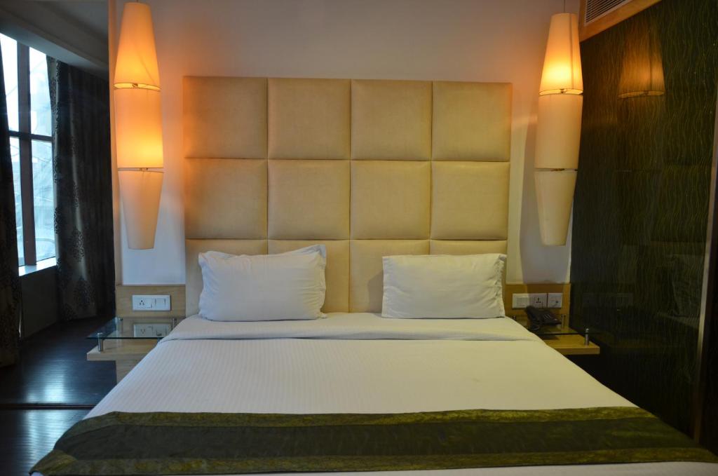 Postel nebo postele na pokoji v ubytování Airport Hotel Grand by Fantasia