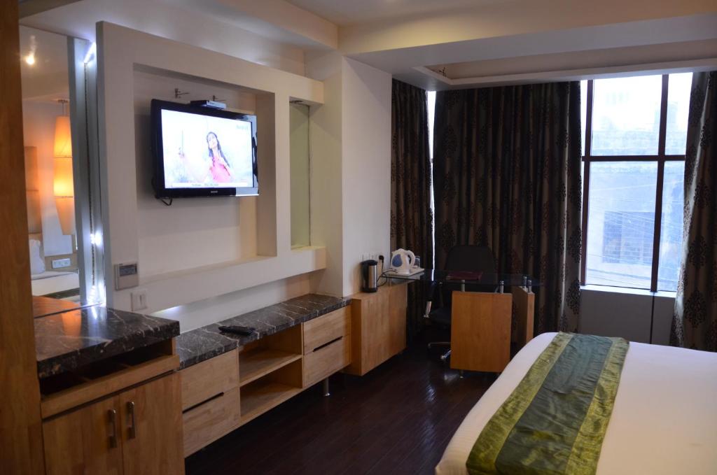 Postel nebo postele na pokoji v ubytování Airport Hotel Grand by Fantasia