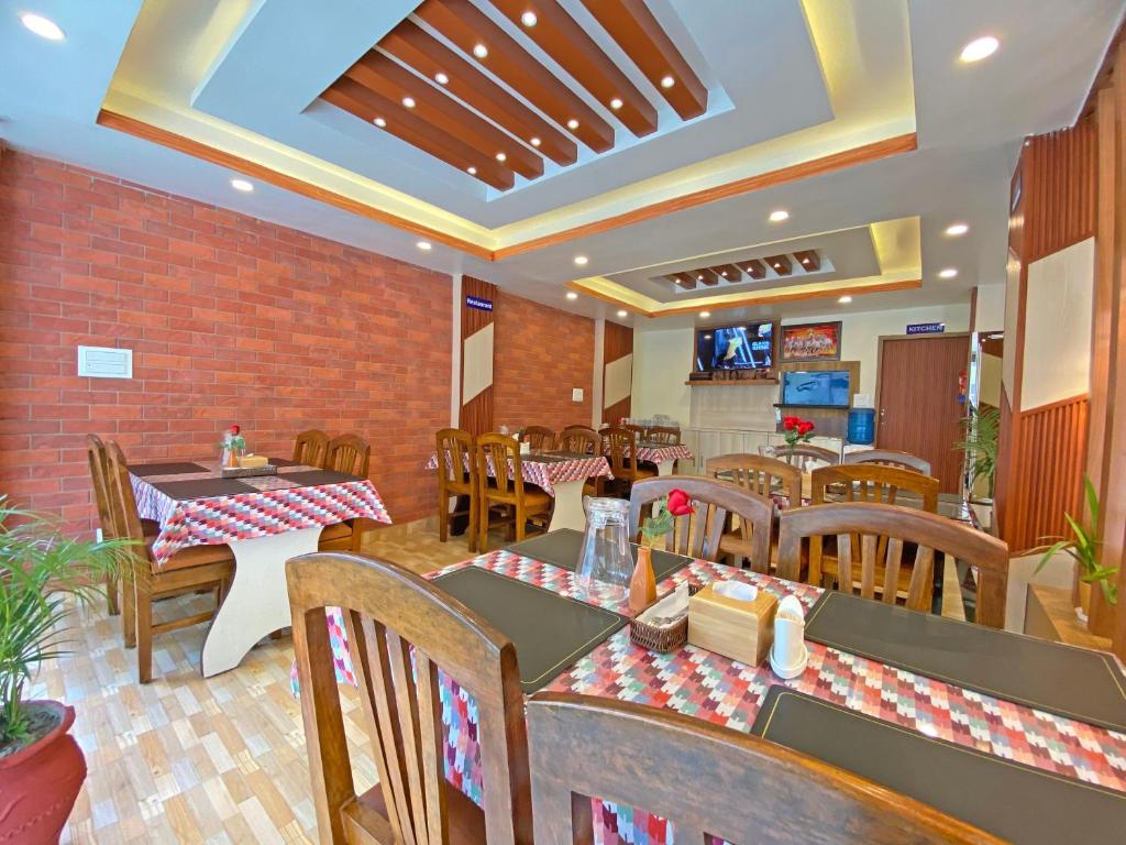 Restoran või mõni muu söögikoht majutusasutuses Hotel Himalayan BTS