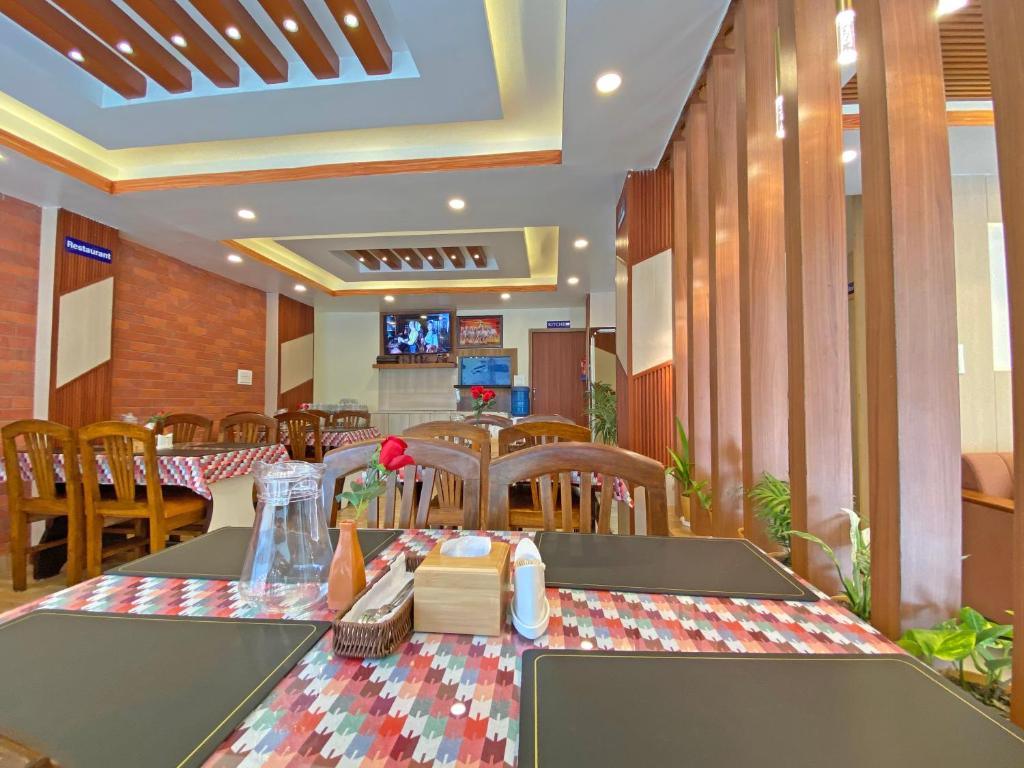 Restoran või mõni muu söögikoht majutusasutuses Hotel Himalayan BTS