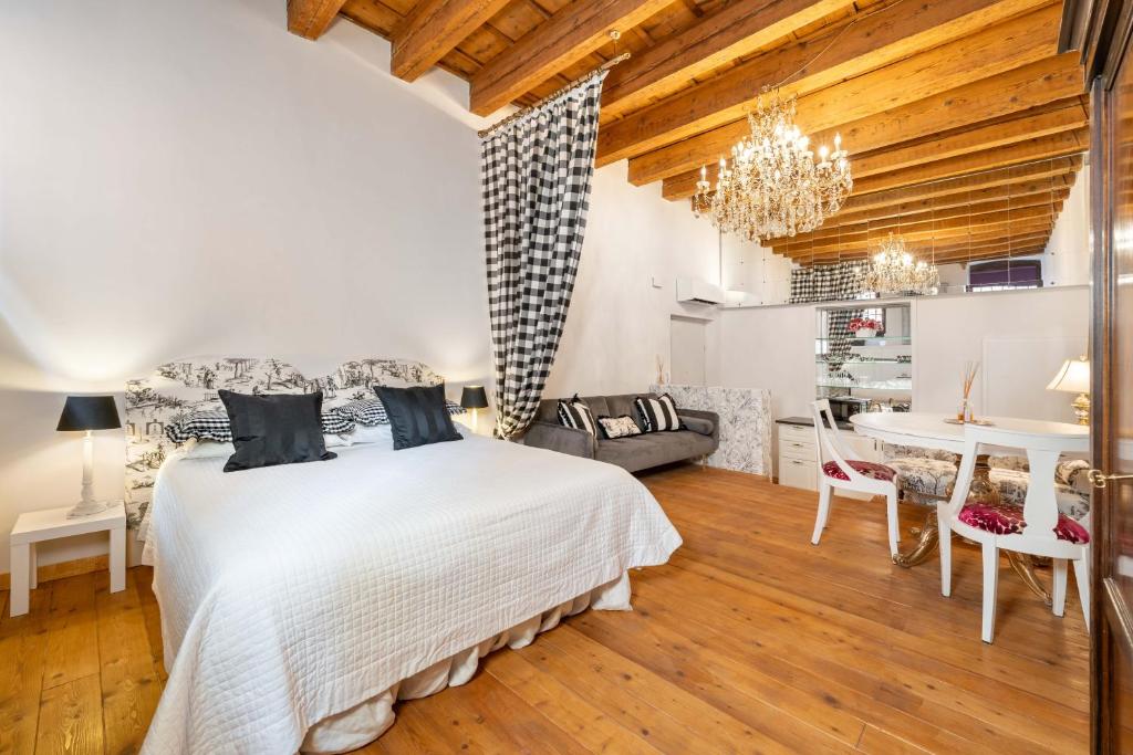 Postel nebo postele na pokoji v ubytování Garçonnière