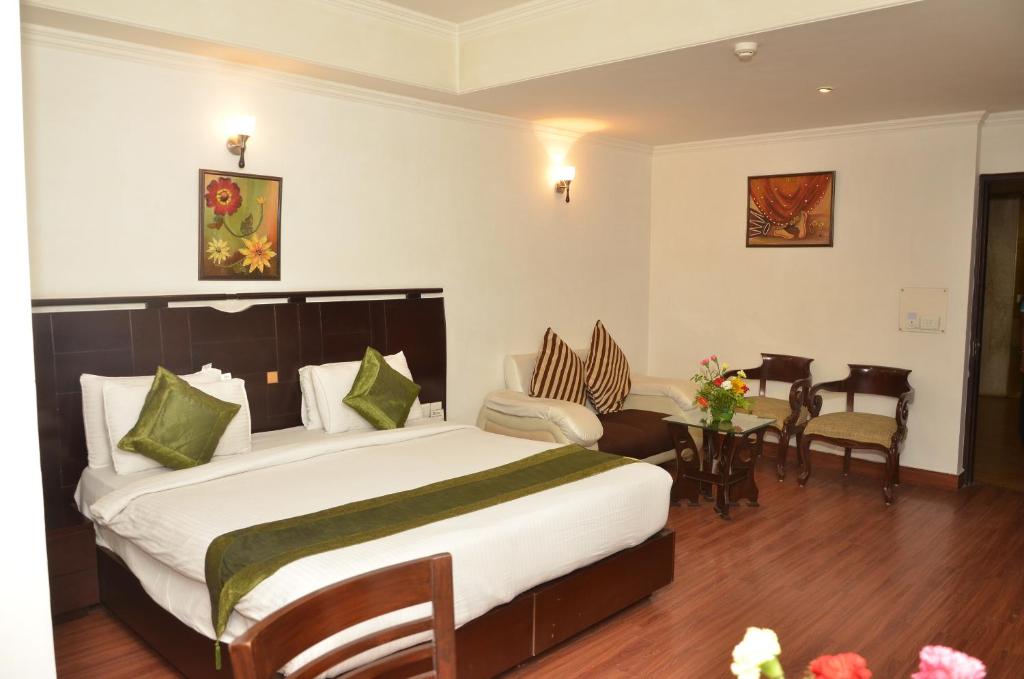 Postel nebo postele na pokoji v ubytování Airport Hotel Grand by Fantasia