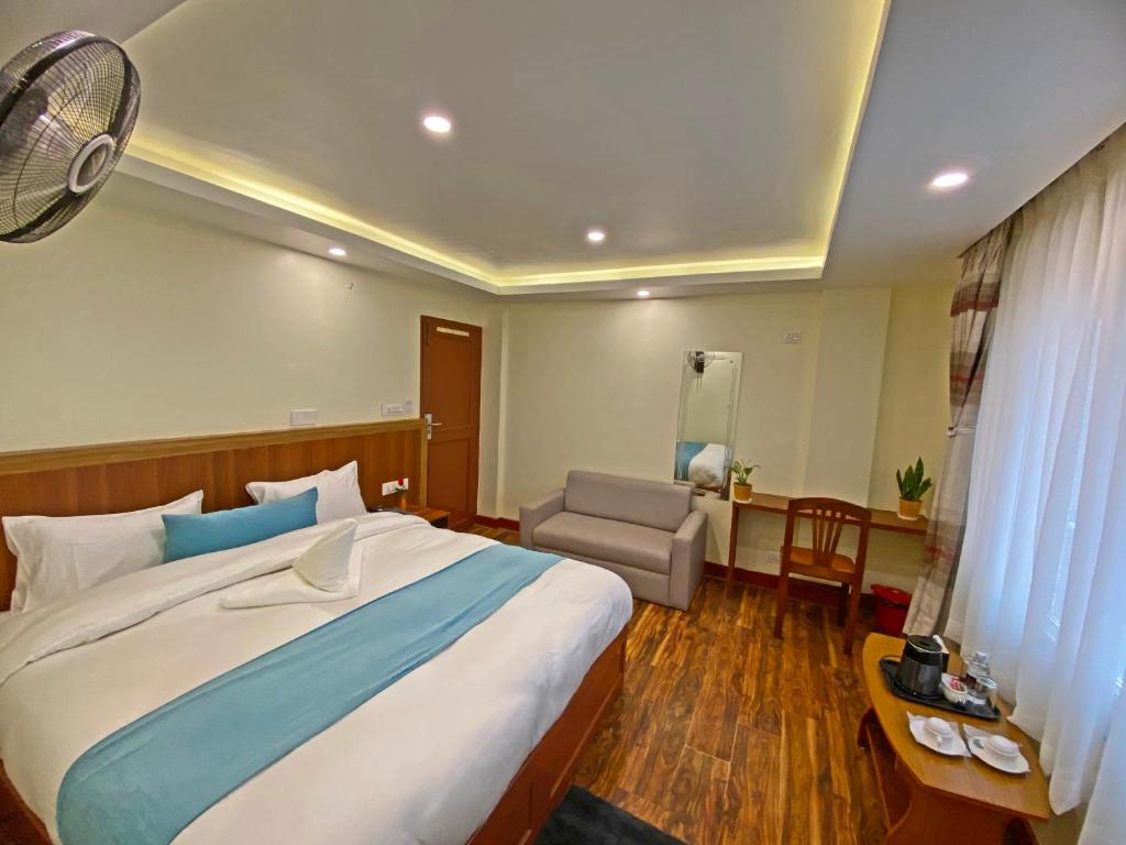 Voodi või voodid majutusasutuse Hotel Himalayan BTS toas