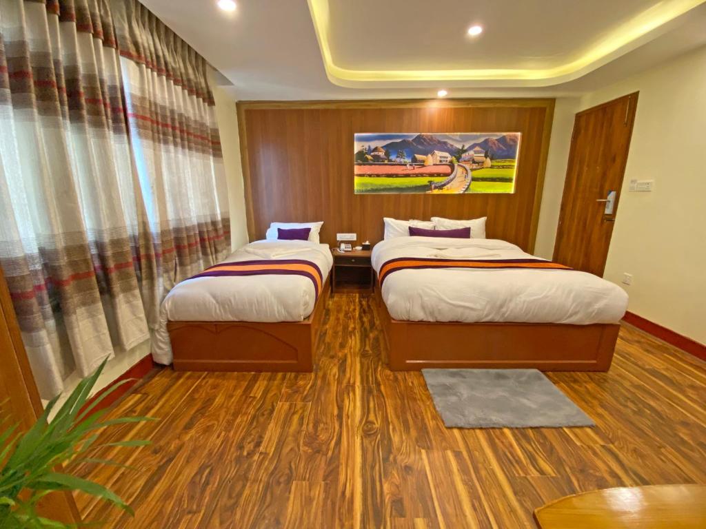 Voodi või voodid majutusasutuse Hotel Himalayan BTS toas