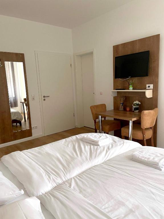 Postel nebo postele na pokoji v ubytování Hotel Oniro