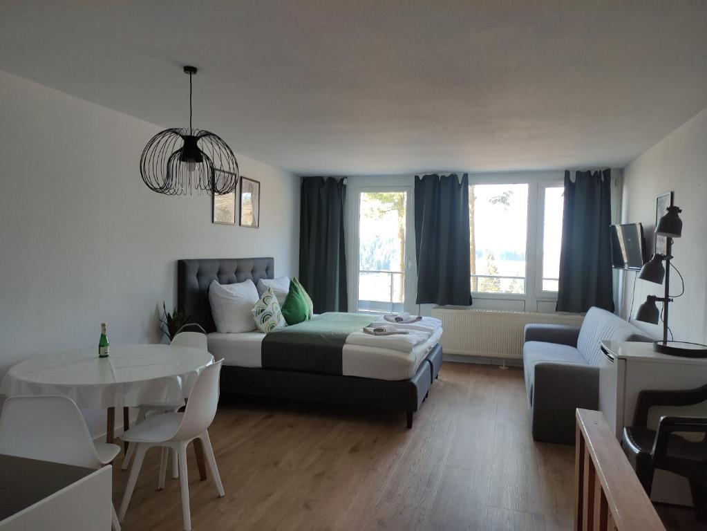 Posezení v ubytování Sauna, Pool und Gartenzugang