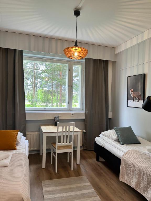 Postel nebo postele na pokoji v ubytování Academy Hotel Kemijärvi