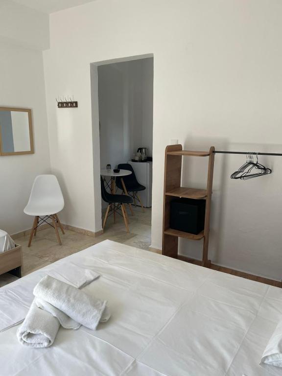 Postel nebo postele na pokoji v ubytování Vesper Rooms