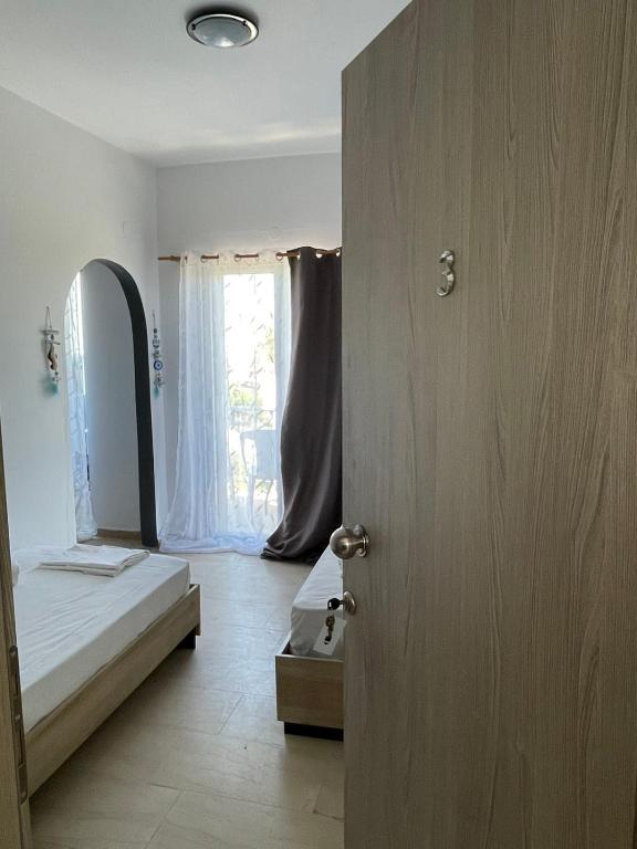 Postel nebo postele na pokoji v ubytování Vesper Rooms
