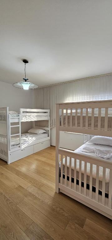 Postel nebo postele na pokoji v ubytování i hostel