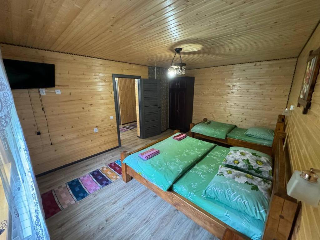 Postel nebo postele na pokoji v ubytování Садиба у Софійки